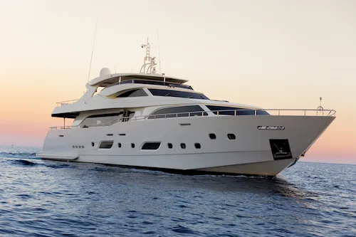 Yacht sailing at sunset in Ibiza